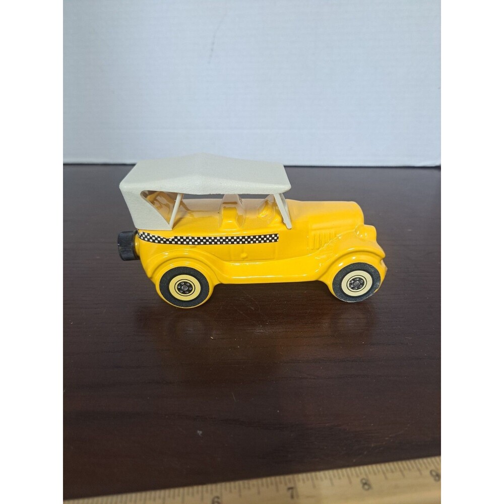 Vintage 1926 Yellow Checkered Cab Glass Avon Bottle
